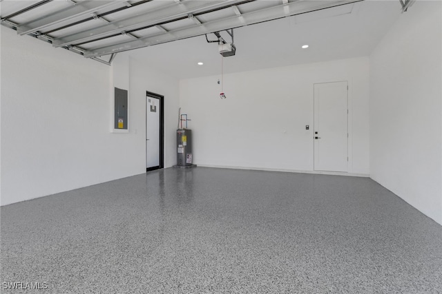 garage featuring a garage door opener, electric panel, and electric water heater