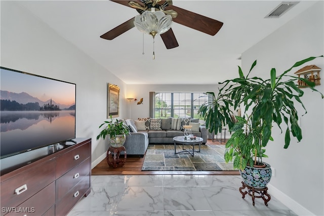 living room featuring ceiling fan