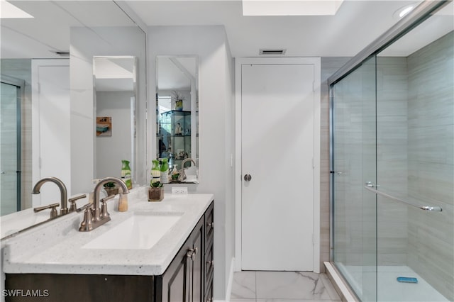 bathroom featuring vanity and walk in shower