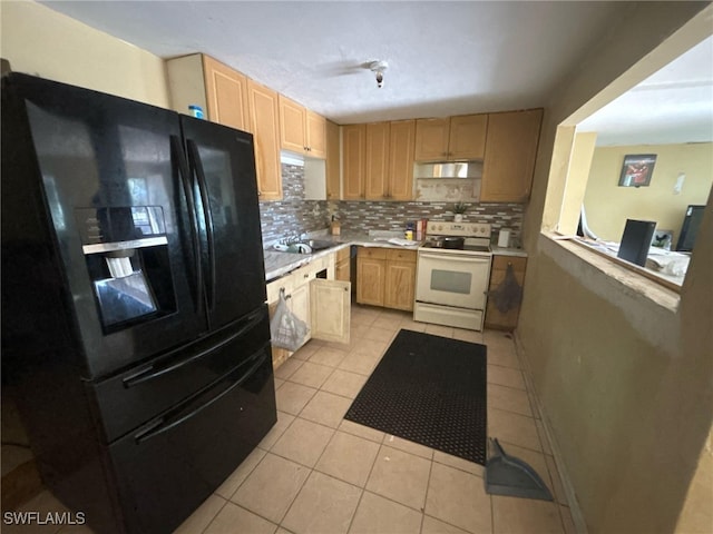 kitchen with black refrigerator with ice dispenser, light brown cabinets, tasteful backsplash, and electric range