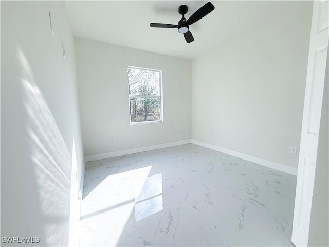 empty room featuring ceiling fan