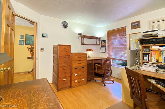 office area with light wood-type flooring