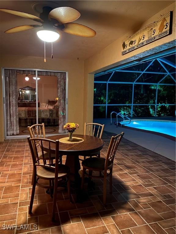 dining area featuring ceiling fan