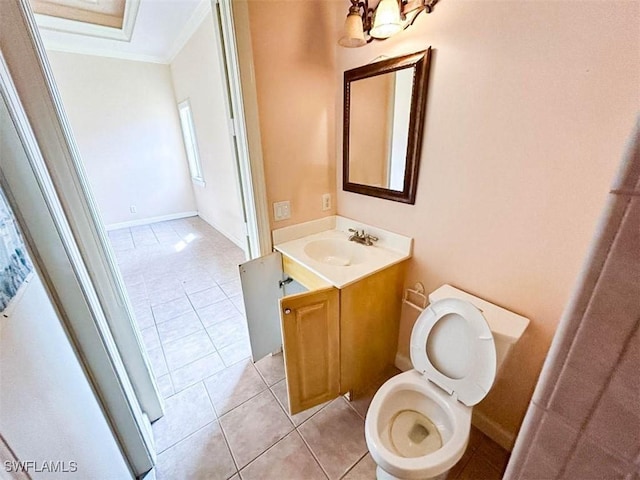bathroom with ornamental molding, tile patterned flooring, vanity, a chandelier, and toilet