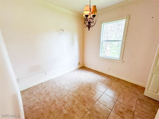 unfurnished room with a chandelier and crown molding