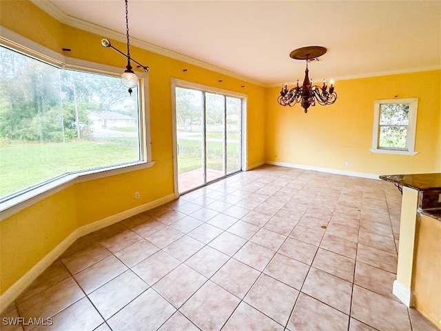 unfurnished dining area featuring ornamental molding, a wealth of natural light, a notable chandelier, and light tile patterned floors