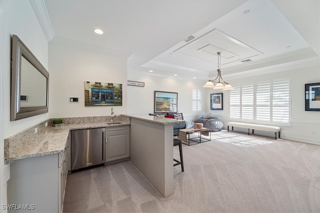 kitchen with light carpet, kitchen peninsula, a breakfast bar, pendant lighting, and dishwasher