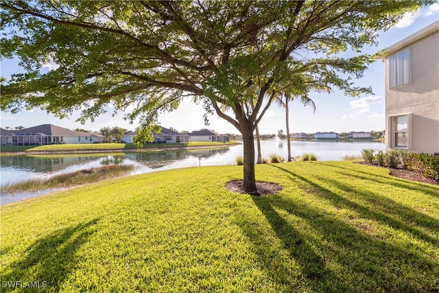 view of yard with a water view