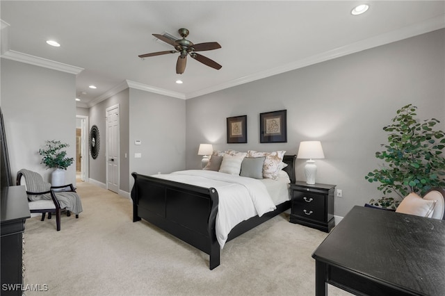 bedroom featuring crown molding, ceiling fan, a closet, and light carpet