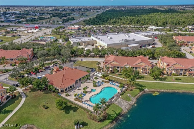 bird's eye view with a water view