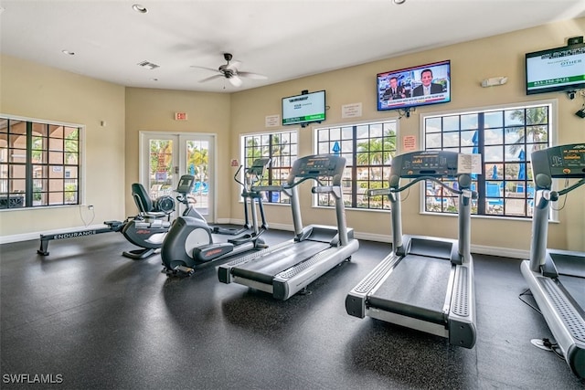 exercise room featuring french doors and ceiling fan