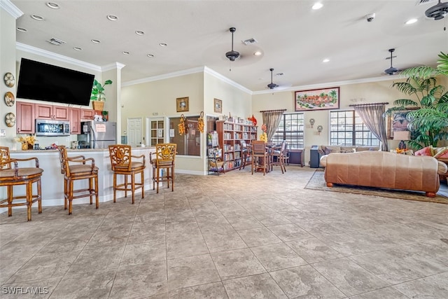 bedroom featuring stainless steel fridge, light tile patterned floors, and ornamental molding