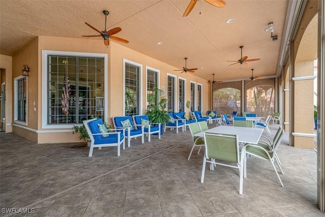 view of patio / terrace with ceiling fan