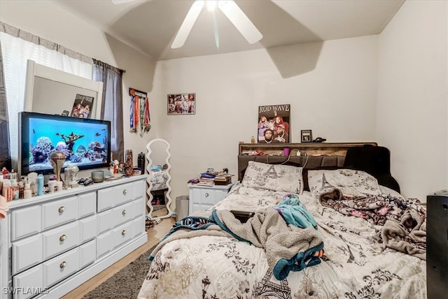 bedroom featuring ceiling fan and light hardwood / wood-style floors