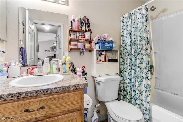 full bathroom with ceiling fan, vanity, toilet, and shower / bath combination with curtain