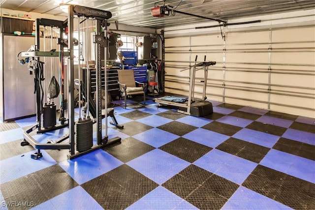 workout area with a garage