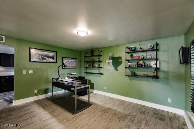 home office featuring wood-type flooring