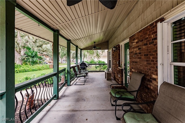 view of patio with a porch and ceiling fan