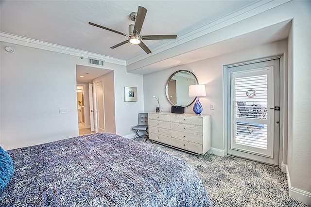 bedroom with ornamental molding, carpet, and ceiling fan