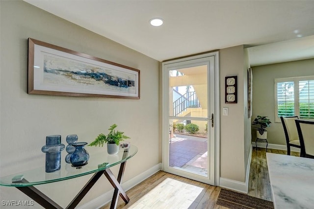 5103 Sunnybrook Ct Unit 3, Cape Coral, FL 33904 - entryway with light wood-type flooring, baseboards, and recessed lighting