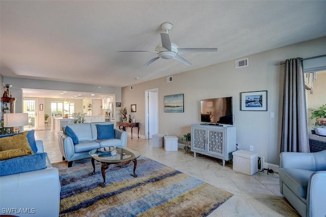 5103 Sunnybrook Ct Unit 3, Cape Coral, FL 33904 - living room with ceiling fan and baseboards