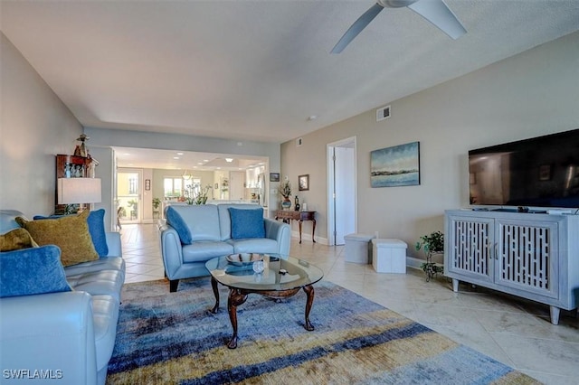 5103 Sunnybrook Ct Unit 3, Cape Coral, FL 33904 - living room featuring light tile patterned flooring, ceiling fan, and baseboards