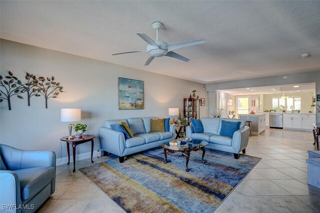 5103 Sunnybrook Ct Unit 3, Cape Coral, FL 33904 - living room featuring light tile patterned flooring, ceiling fan, and a textured ceiling