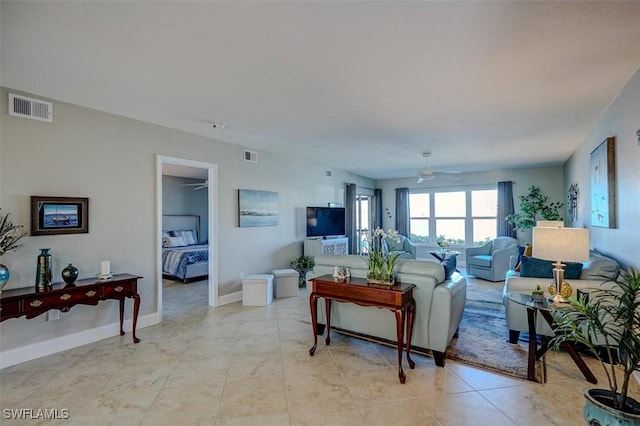 5103 Sunnybrook Ct Unit 3, Cape Coral, FL 33904 - living room featuring ceiling fan and baseboards