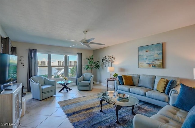 5103 Sunnybrook Ct Unit 3, Cape Coral, FL 33904 - living area featuring light tile patterned floors, ceiling fan, and baseboards