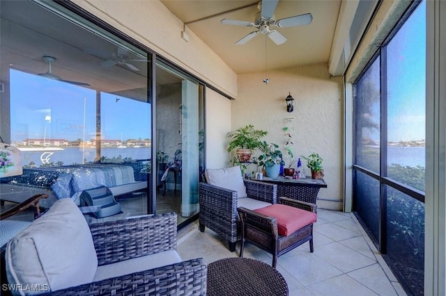 5103 Sunnybrook Ct Unit 3, Cape Coral, FL 33904 - sunroom featuring a ceiling fan and a water view