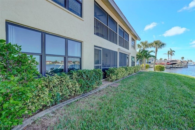 5103 Sunnybrook Ct Unit 3, Cape Coral, FL 33904 - view of green lawn with a water view