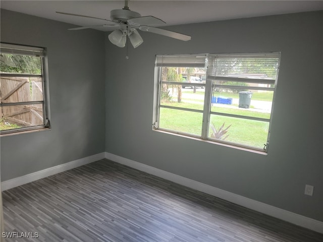 spare room featuring ceiling fan and wood-type flooring