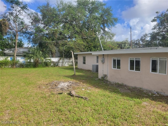 view of yard with central AC