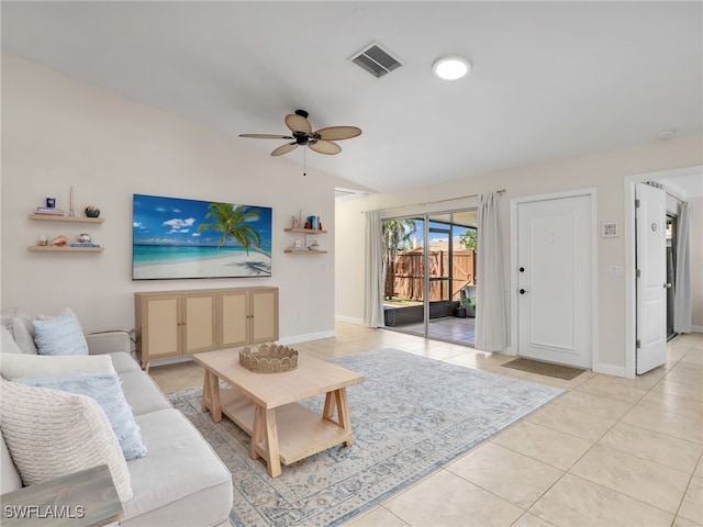 tiled living room featuring ceiling fan