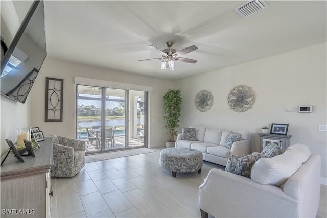 living room with ceiling fan