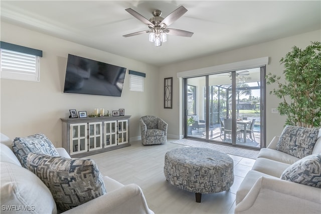 living room featuring ceiling fan