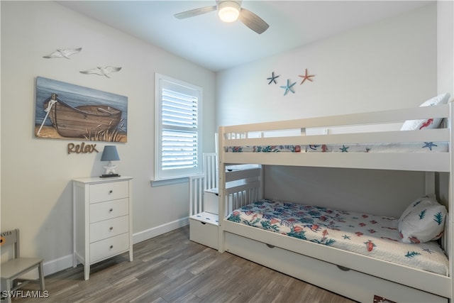 bedroom featuring ceiling fan and wood-type flooring