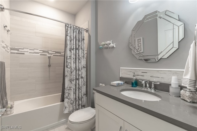 full bathroom featuring vanity, toilet, backsplash, and shower / tub combo