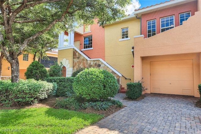 view of front of property with a garage