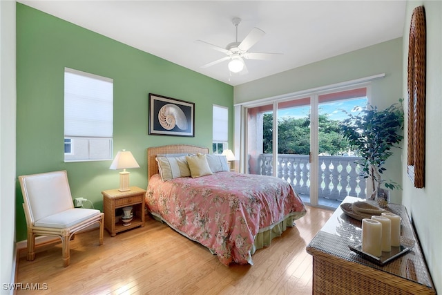 bedroom with ceiling fan, light hardwood / wood-style floors, and access to outside