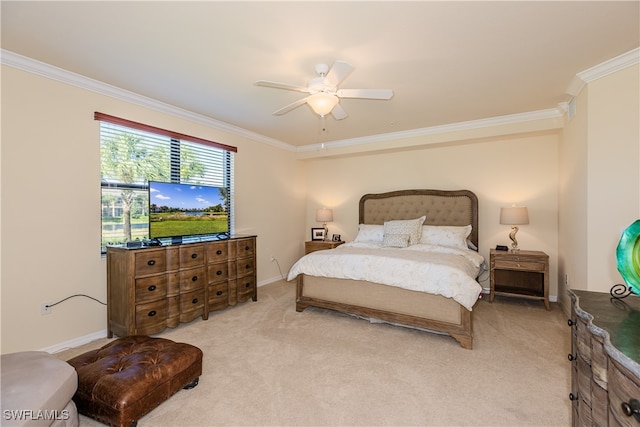 bedroom featuring ceiling fan, crown molding, and light carpet