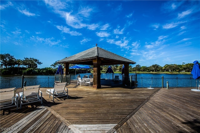 dock area with a deck with water view and a gazebo