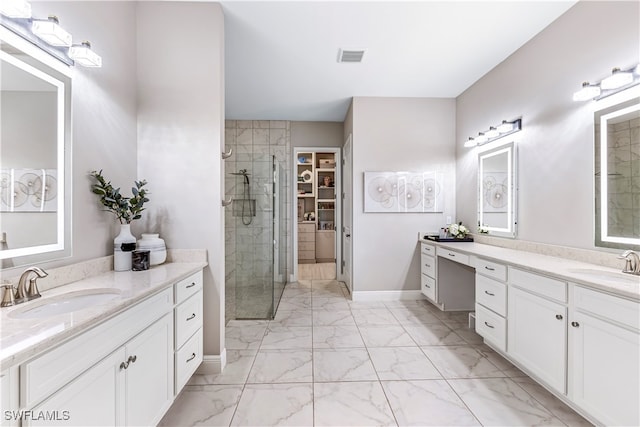 bathroom featuring vanity and walk in shower