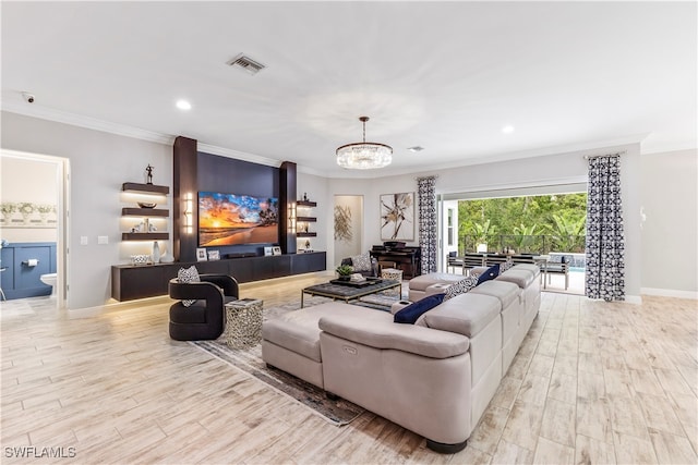 living room featuring light hardwood / wood-style floors, ornamental molding, and an inviting chandelier