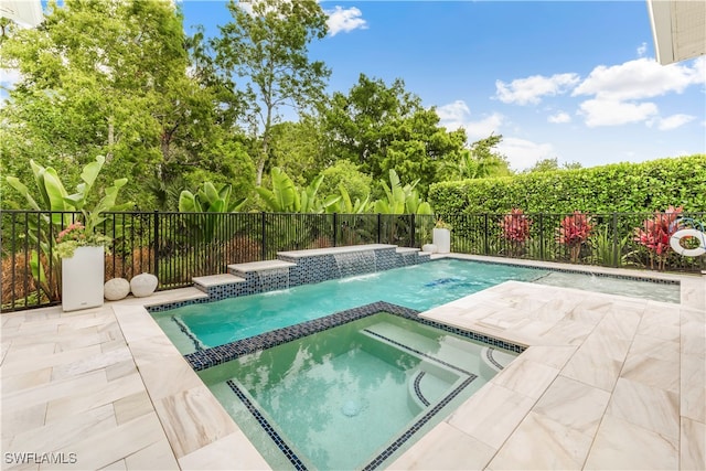 view of swimming pool featuring an in ground hot tub and pool water feature