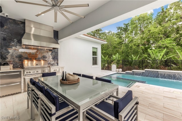 view of swimming pool with area for grilling, pool water feature, ceiling fan, grilling area, and a patio