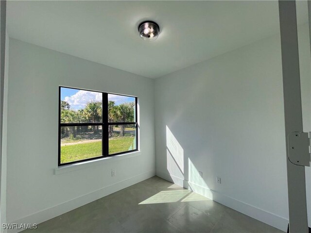 442 4th St SE, Naples, FL 34117 - spare room with baseboards