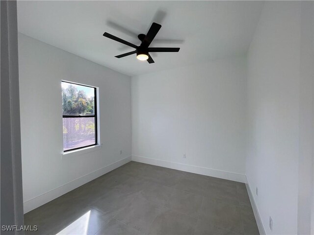 442 4th St SE, Naples, FL 34117 - spare room with baseboards and a ceiling fan