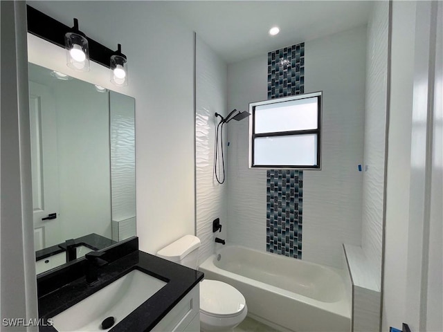 442 4th St SE, Naples, FL 34117 - bathroom with toilet, vanity, and tub / shower combination