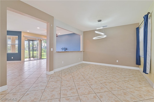 empty room featuring light tile patterned flooring